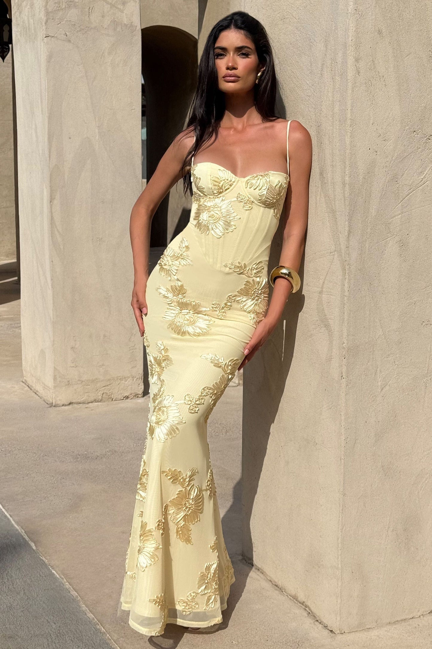Fitted cream maxi dress with gold floral pattern and thin adjustable straps