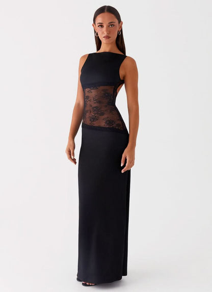 Black cocktail maxi dress with lace cutout at waist, front view