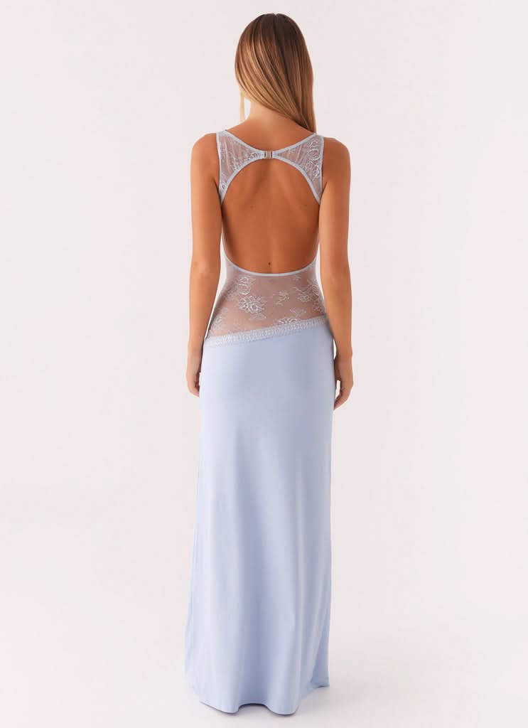 Light blue maxi dress with open back and lace waist panel detail