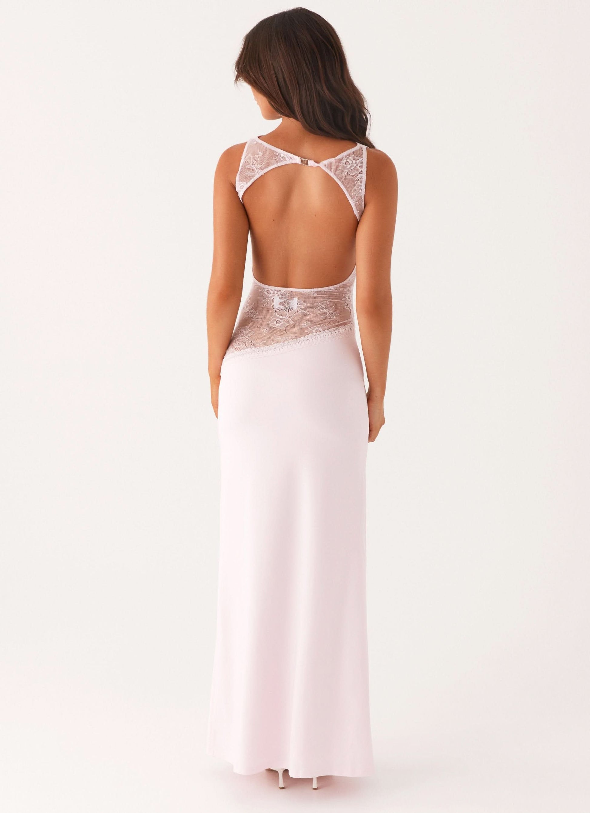 Pale pink maxi dress with open back cutout and sheer lace waist