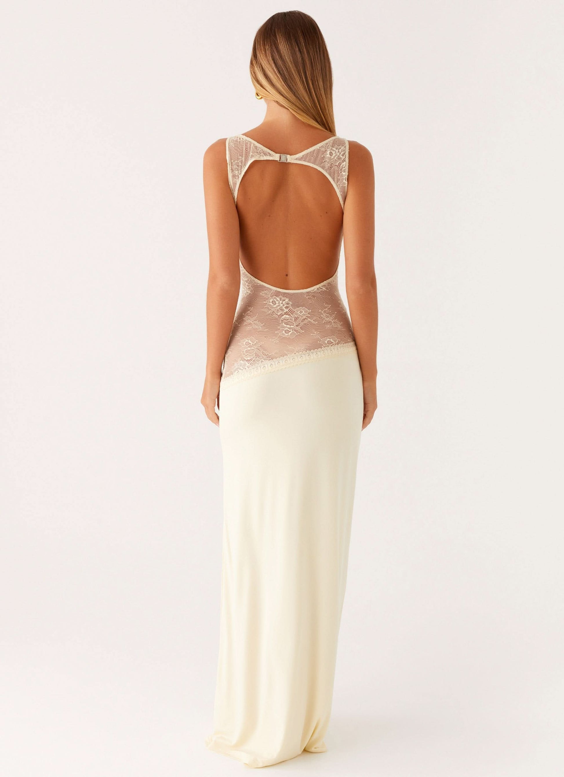 Cream maxi dress with open back and lace waist detail, back view