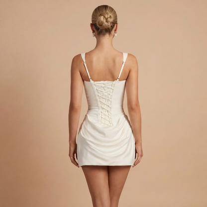 Cream mini dress back view showing corset lacing detail