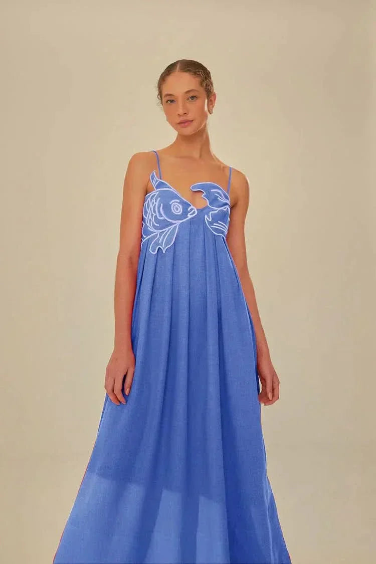 Blue spaghetti strap maxi dress featuring white fish print design