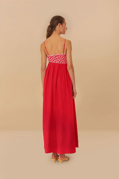 Red maxi dress back view showing fish print waistband detail