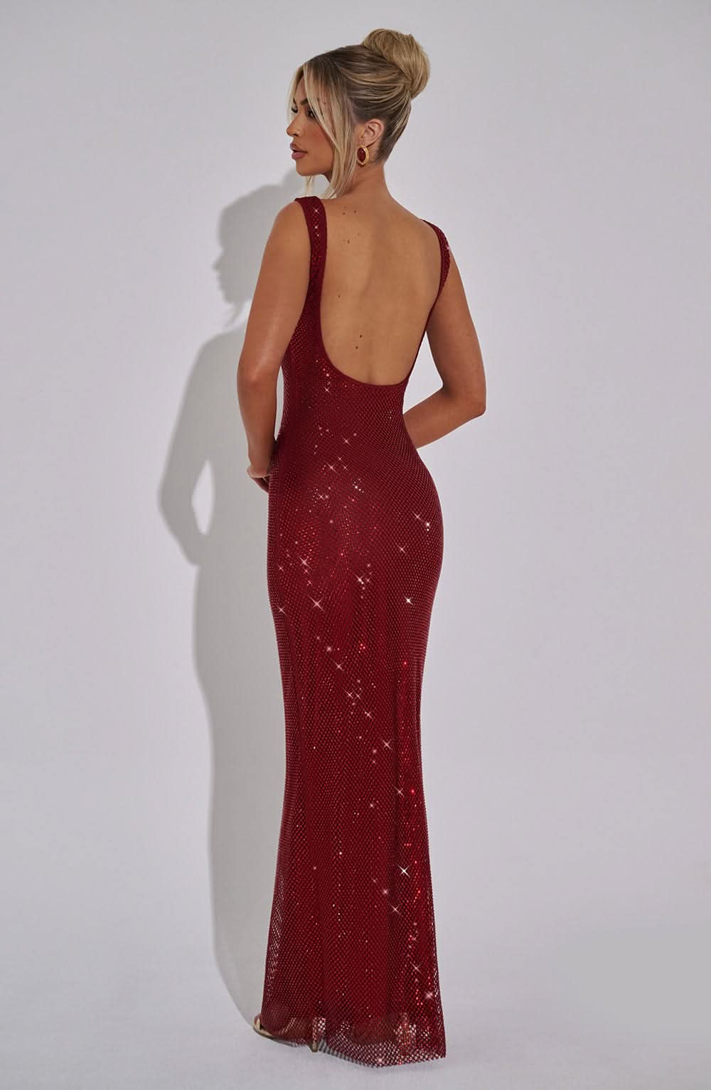 Back view burgundy sequin maxi dress with low open back