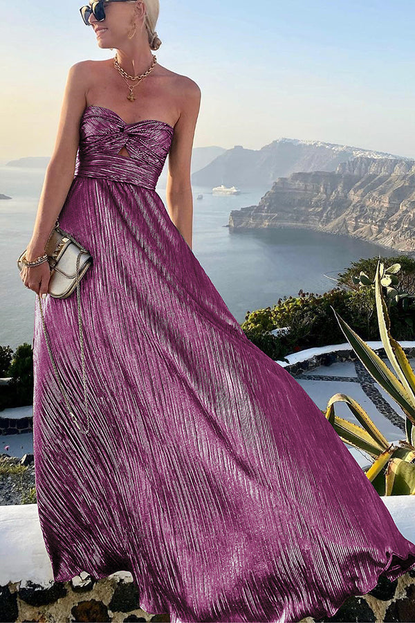 Burgundy strapless pleated maxi dress with sweetheart neckline and flowing skirt