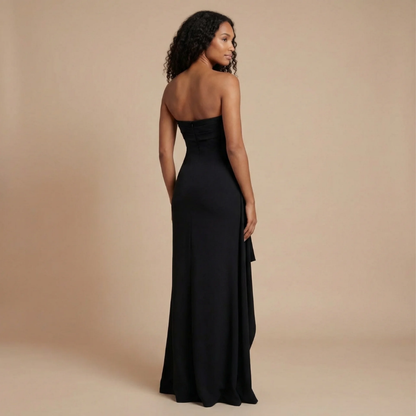 Back view of black strapless maxi dress with ruching