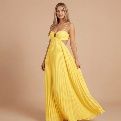 Bright yellow halter maxi dress with pleated skirt and side cutout detail