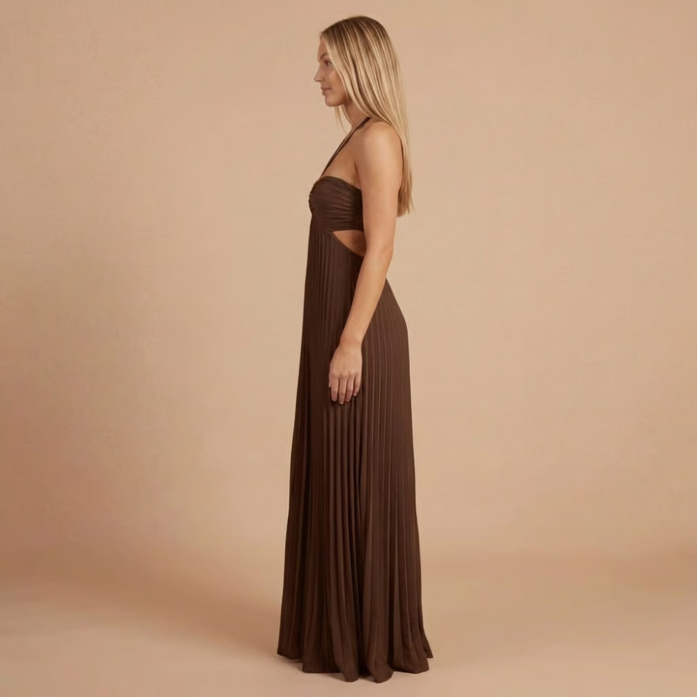 Side angle of chocolate brown pleated maxi dress with halter top