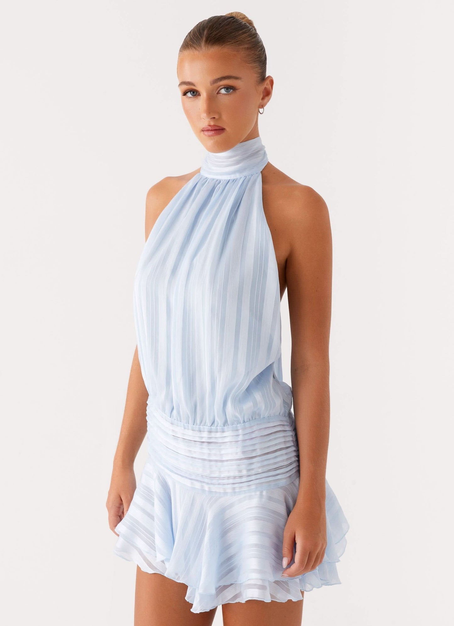 Light blue pleated chiffon halter mini dress with high neckline