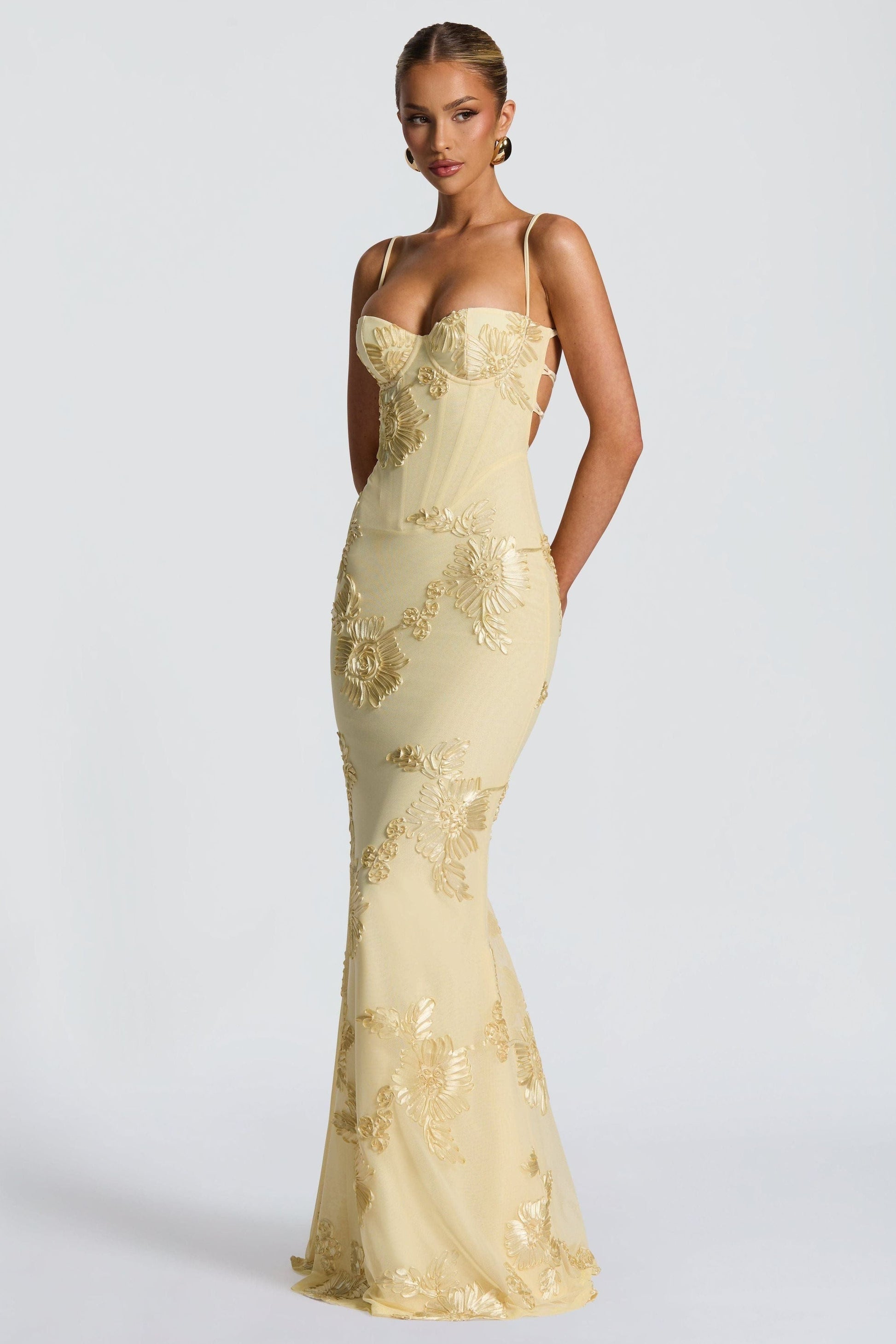 Cream prom maxi dress with side cutouts and gold flower embroidery throughout