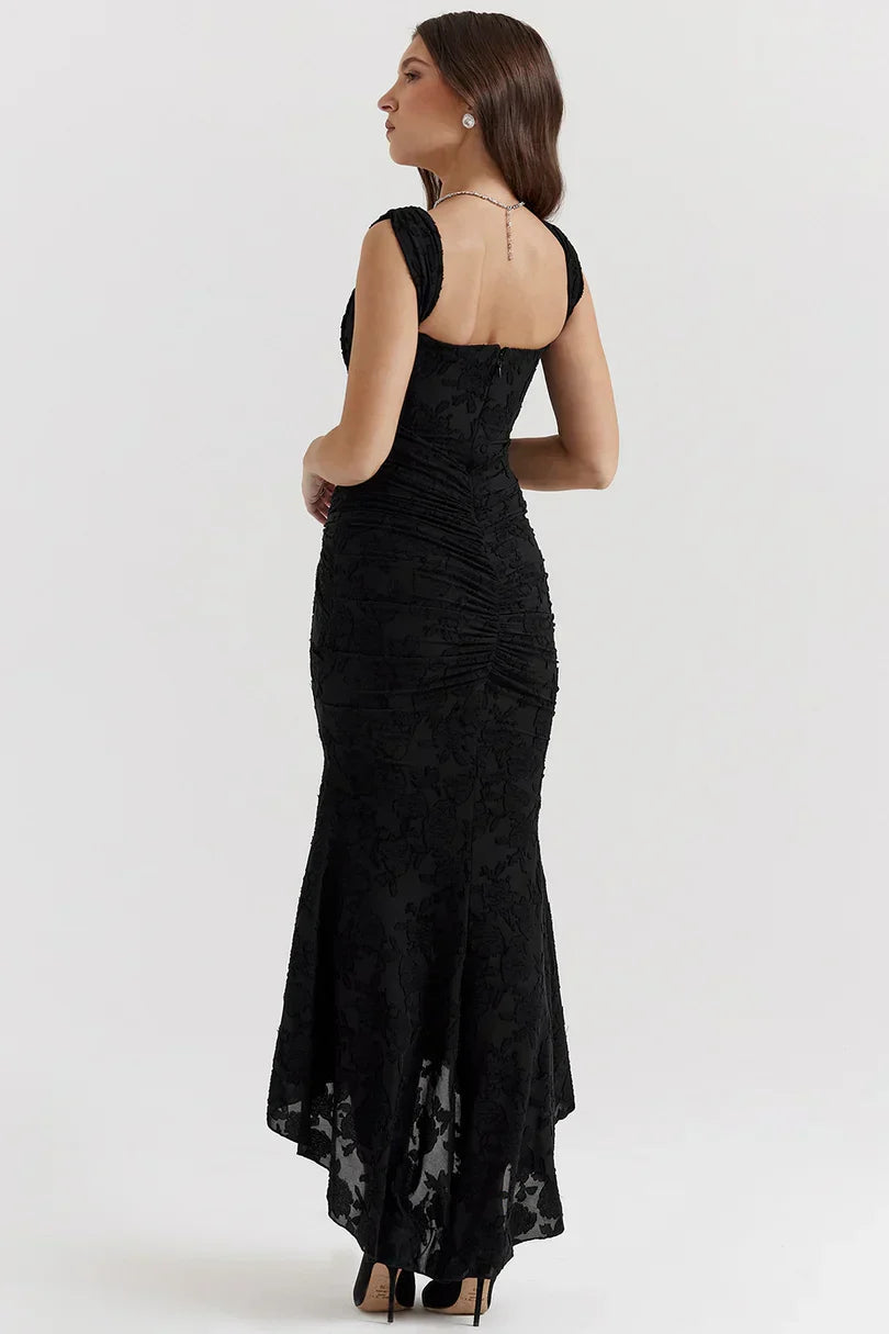Rear angle of black corset maxi dress with ruched detailing