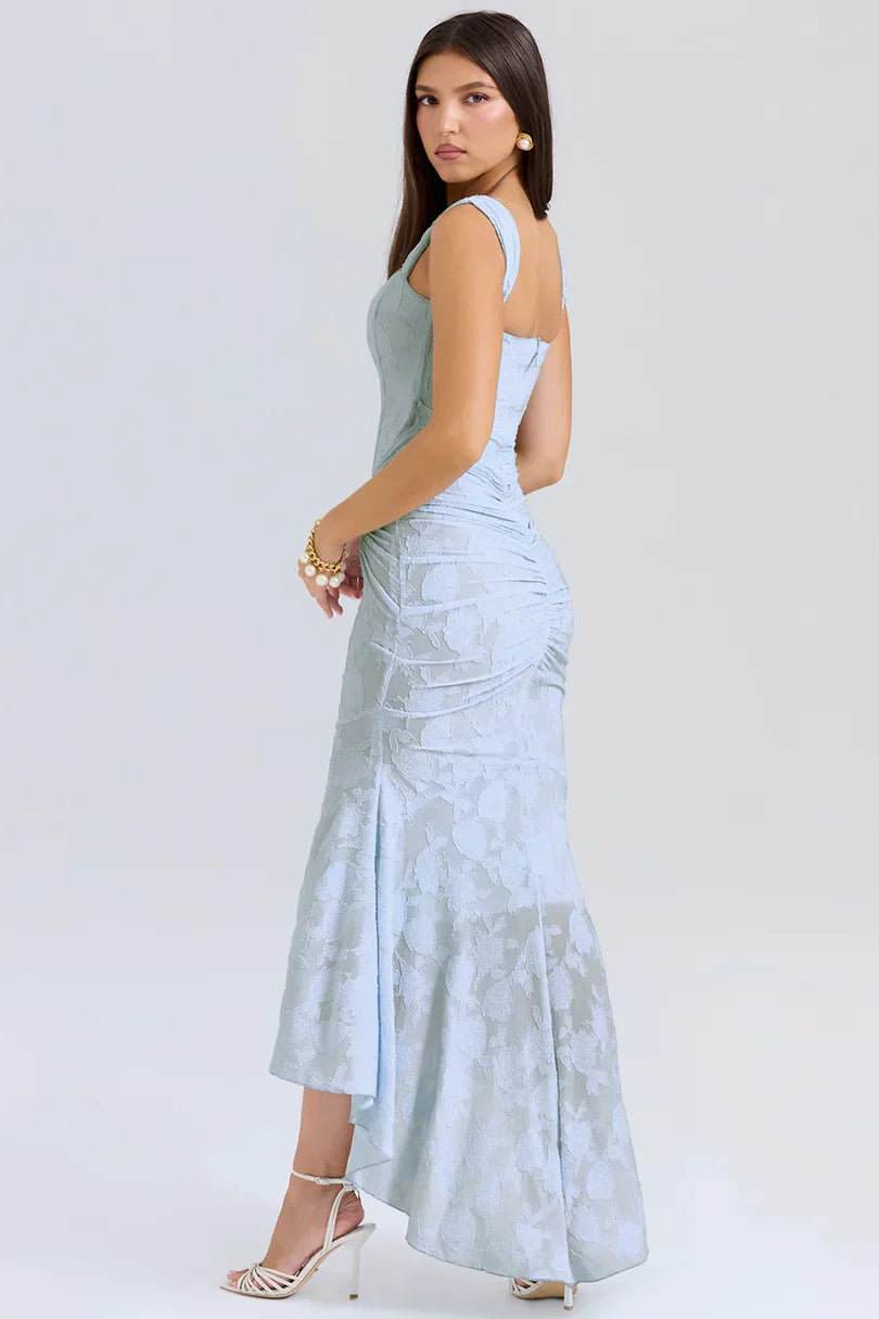 Back view of light blue floral maxi dress showing ruched corset detail