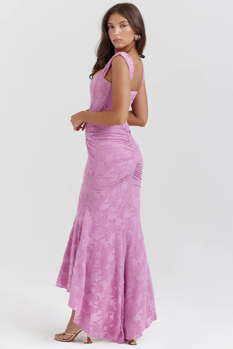 Back view of mauve floral corset maxi dress with ruched detailing