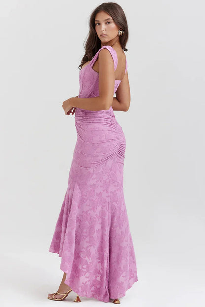 Back view of mauve floral corset maxi dress with ruched detailing