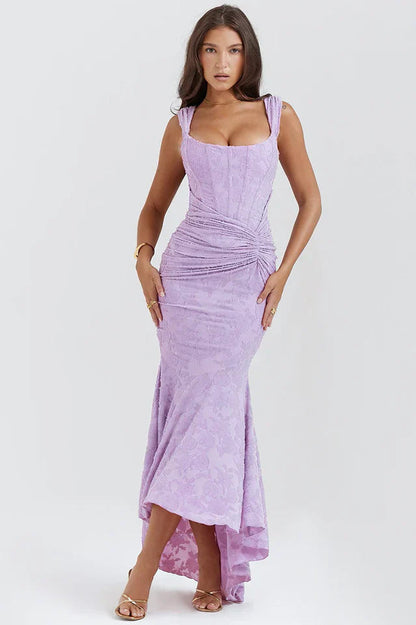 Rear view of lavender floral maxi dress showing corset ruching