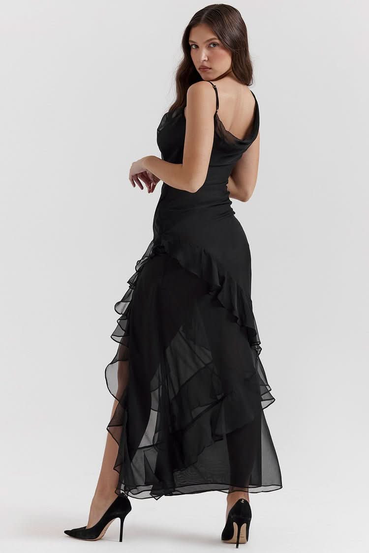 Back view of black square neck ruffled maxi dress with open back detail