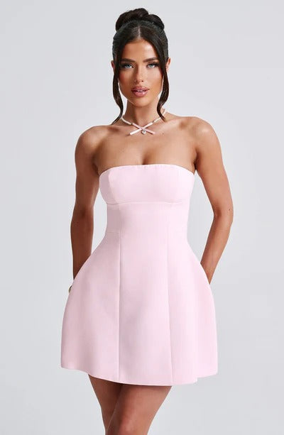 Blush pink strapless A-line bubble mini dress with fitted bodice and side pockets