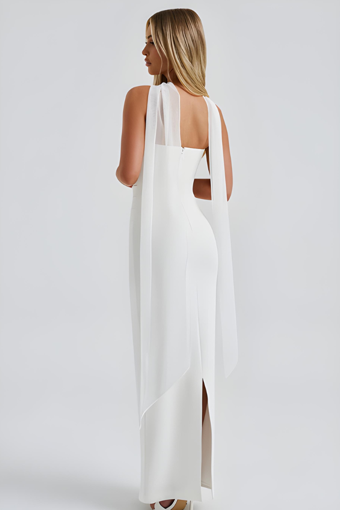 Back view of white strapless maxi dress with draped sheer scarf detail
