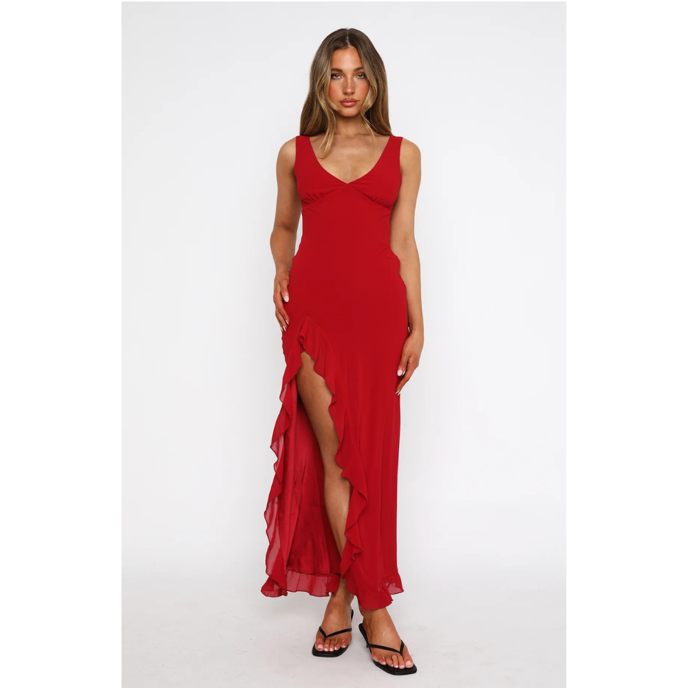 Red v-neck sleeveless maxi dress with asymmetrical ruffled detail