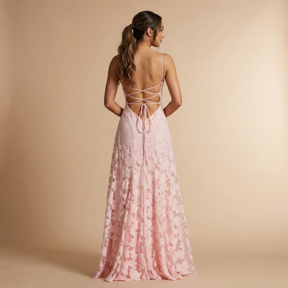 Back view of pink floral lace maxi dress showing lace-up strappy back closure