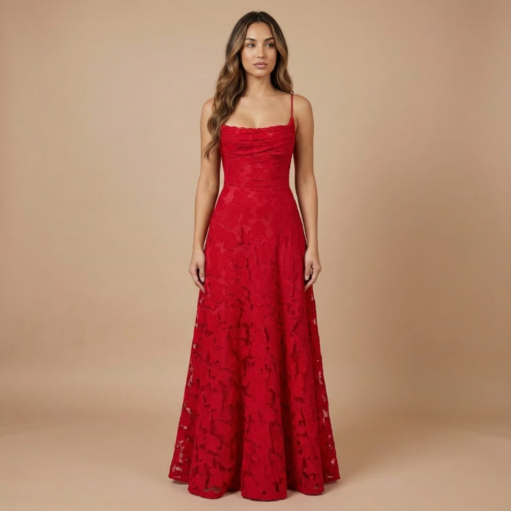 Red lace maxi wedding guest dress with fitted bodice and flowing skirt