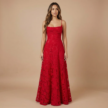 Red lace maxi wedding guest dress with fitted bodice and flowing skirt