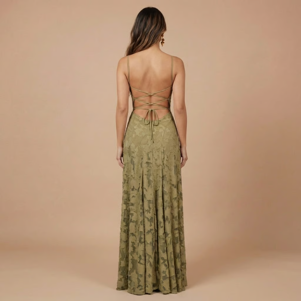Back view of sage green lace maxi dress with lace-up strappy back detail