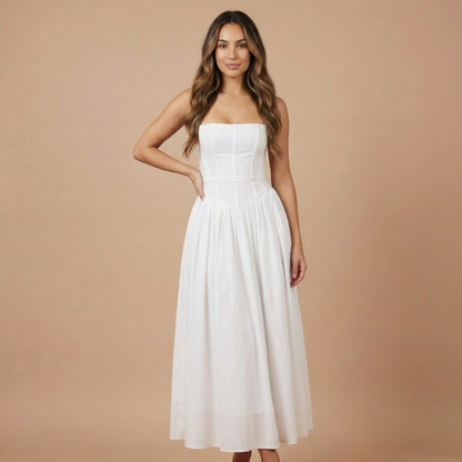 White strapless midi dress with pleated bodice and flowing skirt