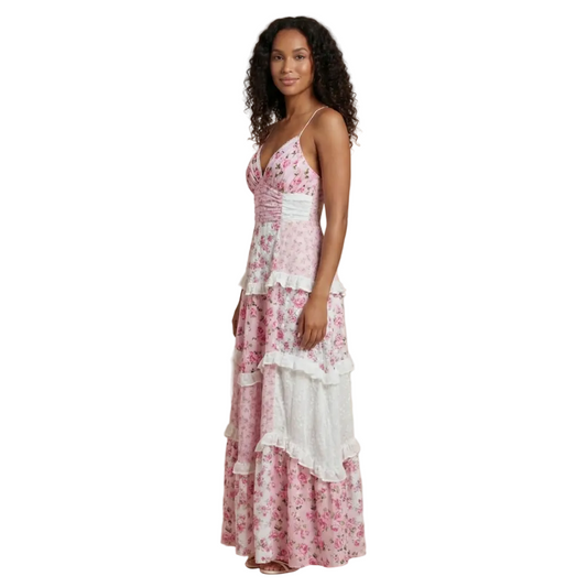 Women's pink floral maxi dress with V-neckline and tiered white ruffle layers