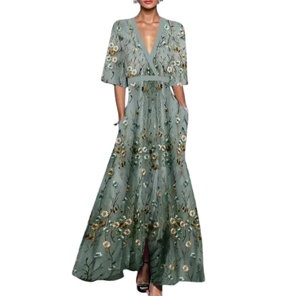 Sage green floral maxi dress with v-neck, half sleeves, and functional pockets