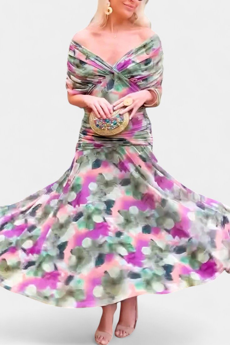 Side profile of floral off-shoulder dress with ruched waist and flowing skirt