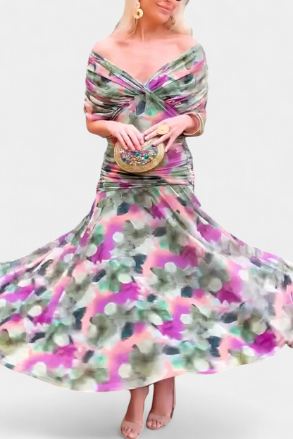 Side profile of floral off-shoulder dress with ruched waist and flowing skirt