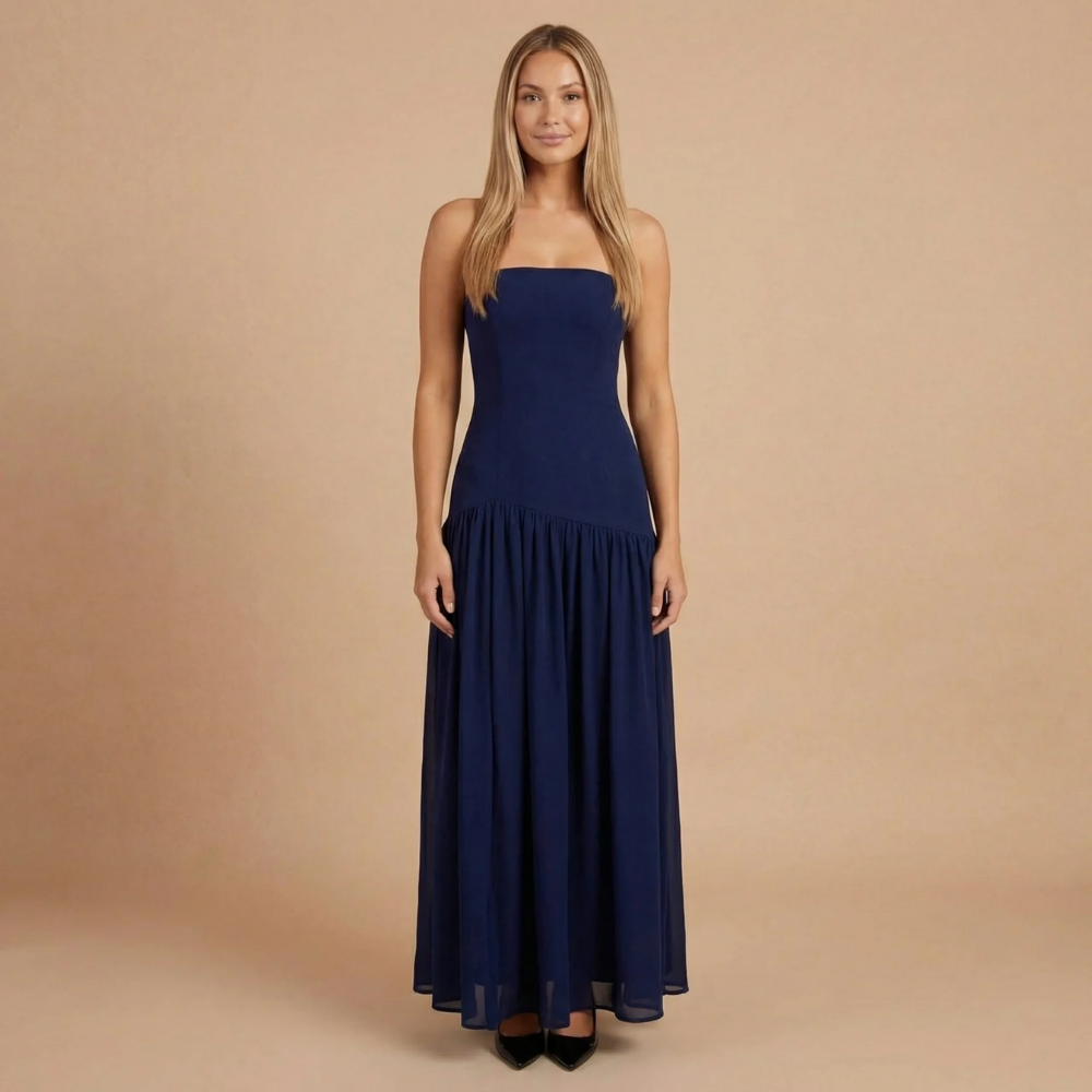 Navy blue strapless maxi dress with fitted top and tiered skirt