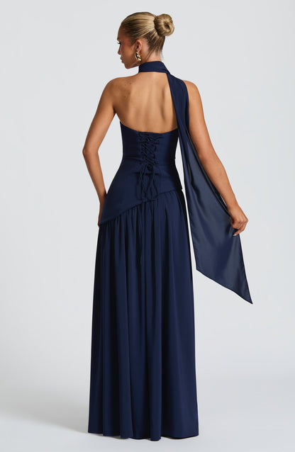 Navy halter strapless maxi dress with ruched bodice and flowing slit back view