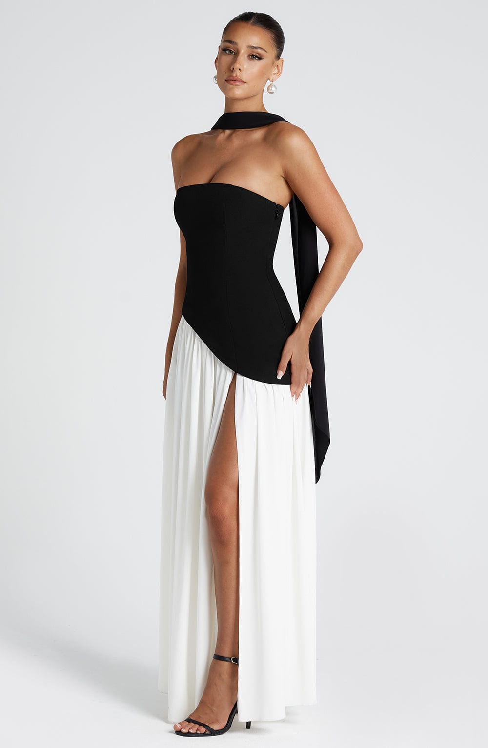 Black and white color-block strapless maxi dress with draped scarf detail