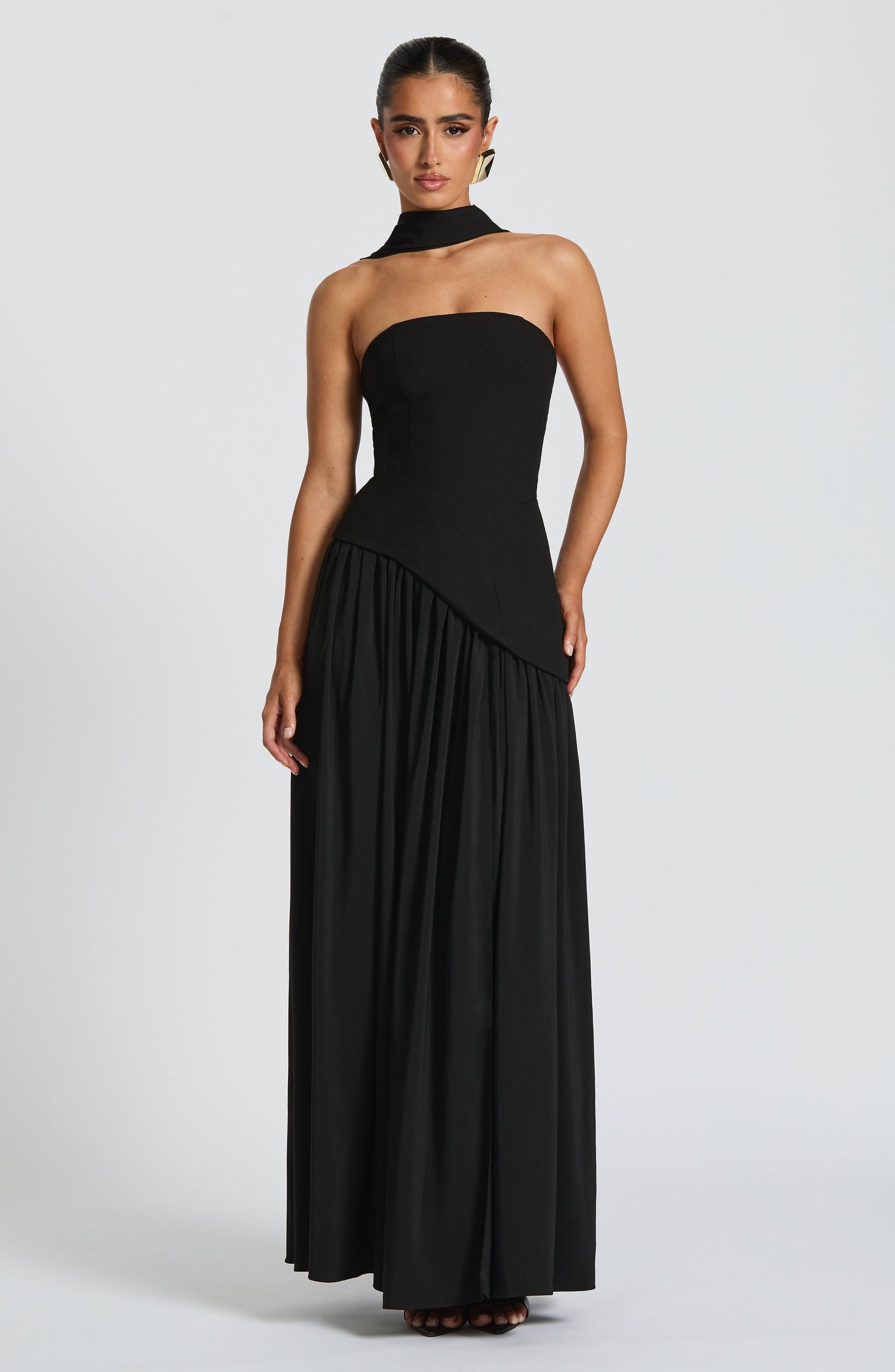 Black strapless maxi dress with choker collar and diagonal pleated slit