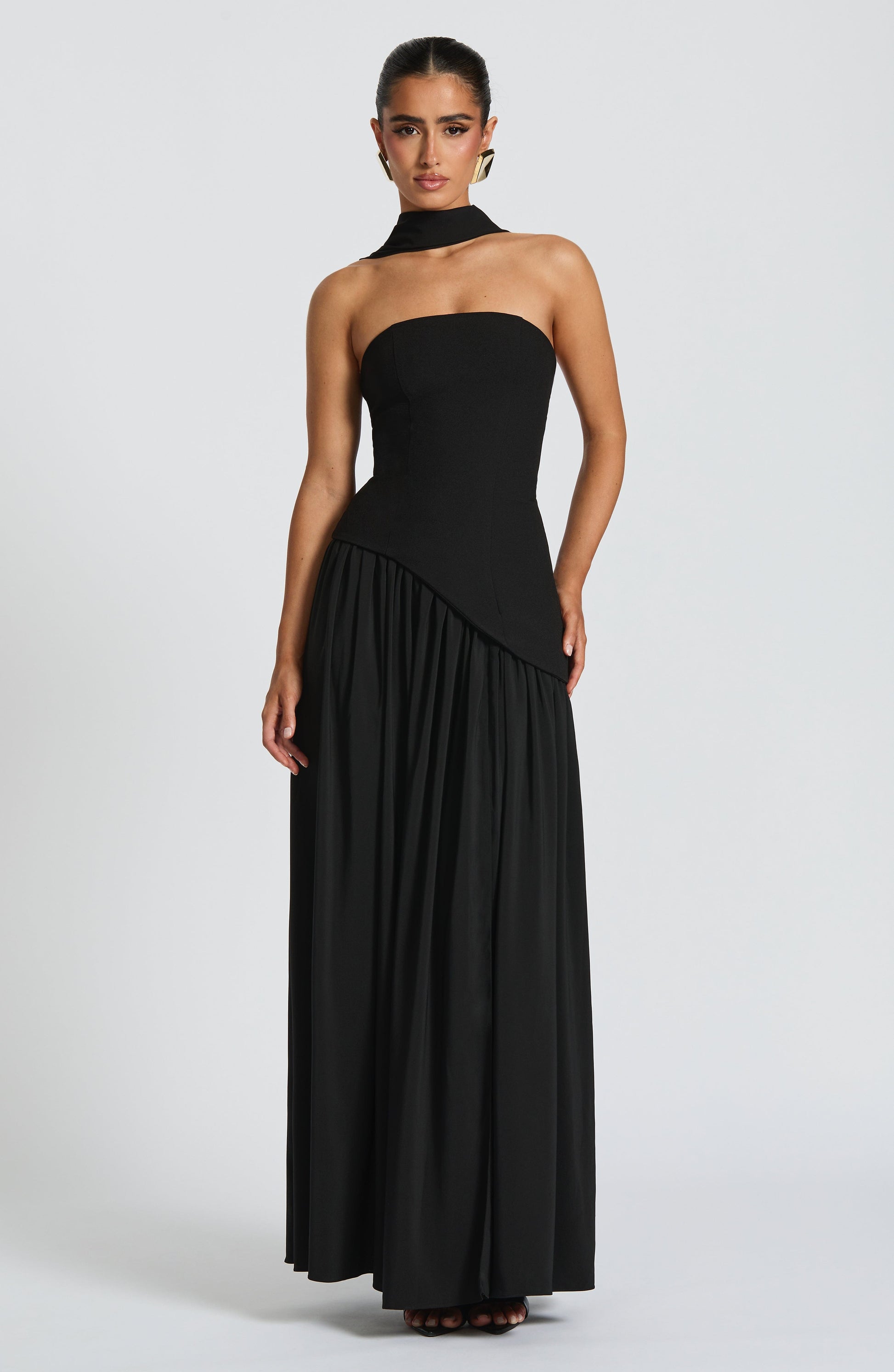 Black strapless maxi dress with choker collar and diagonal pleated slit